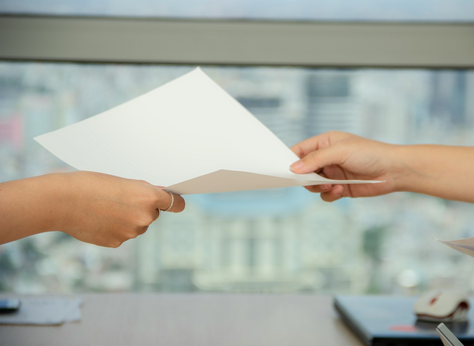 Find Work person handing over paper