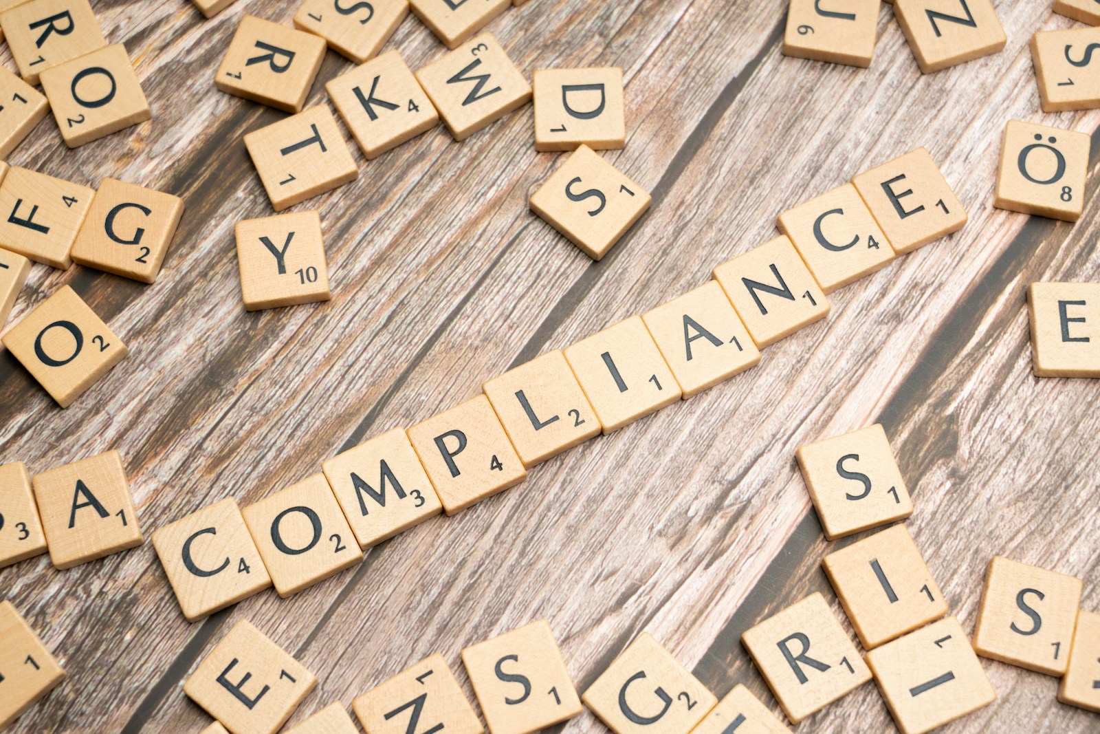 Hire staff scrabble tiles spelling out the word complaints