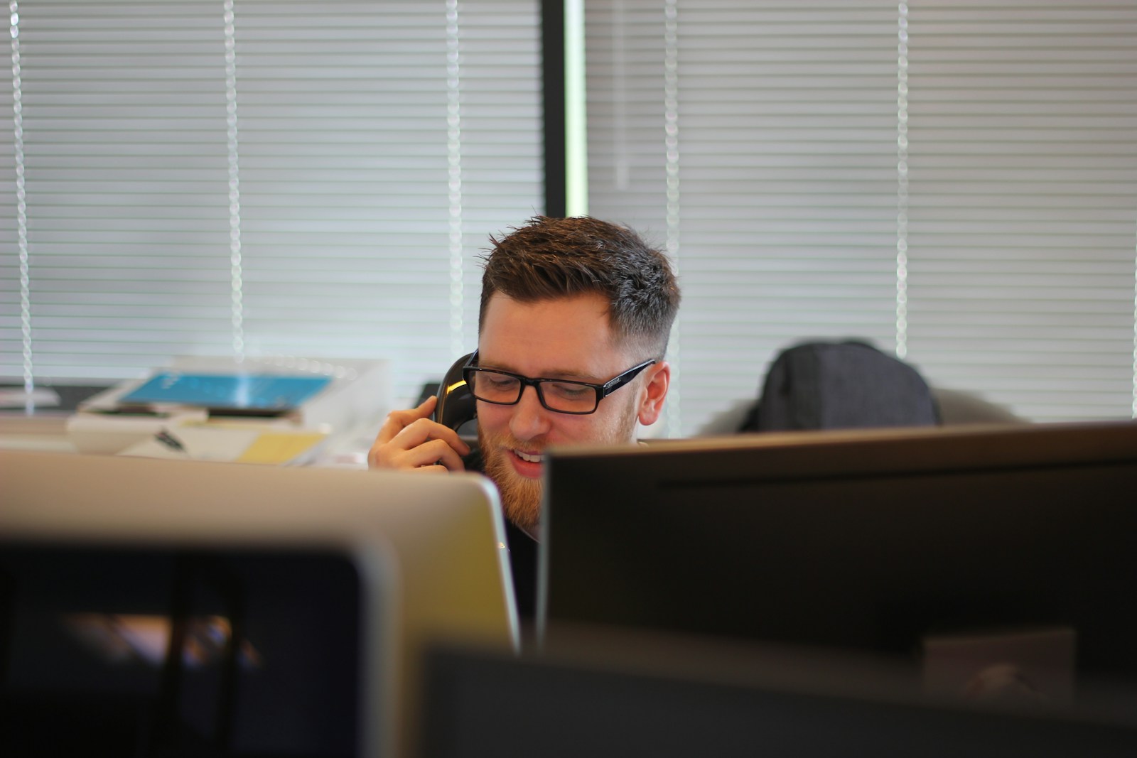 Find Work man using IP phone inside room